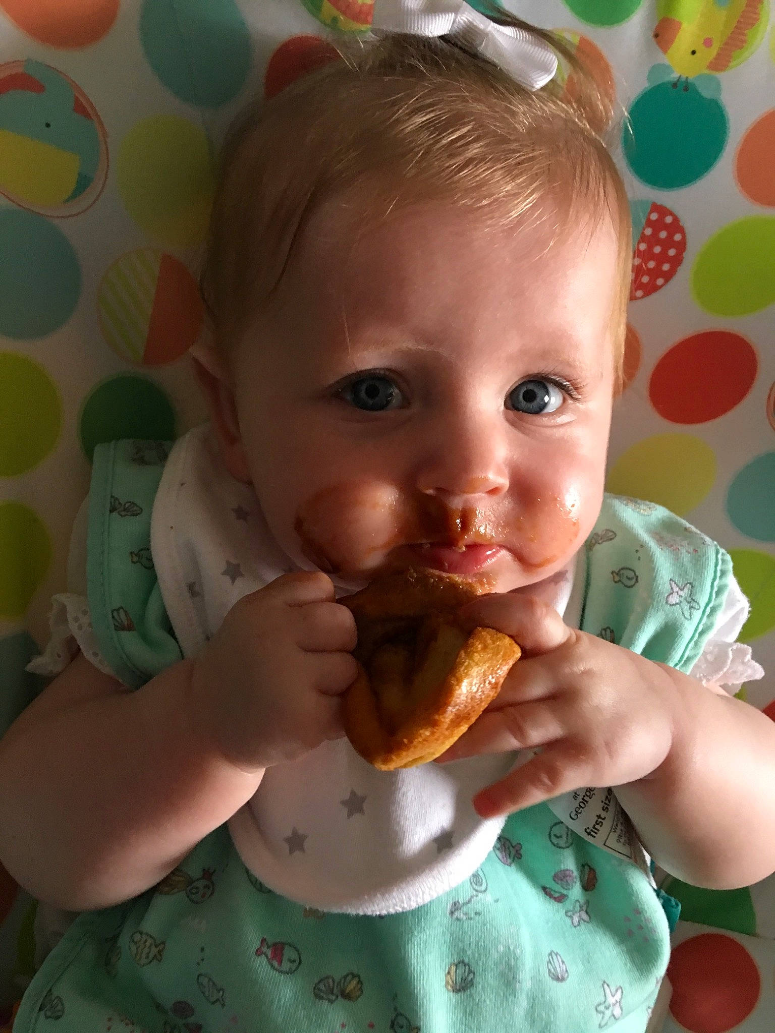 Nellie May is registered to the contest to win money with this photo: baby, child, eating, food, person, sweetness, toddler