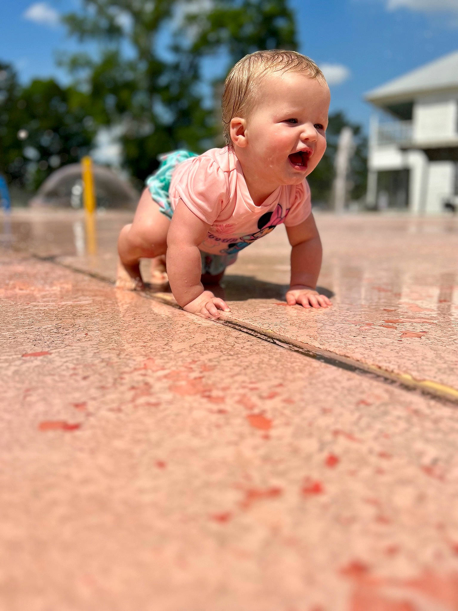 Harper is registered to the contest to win money with this photo: baby, baby_toddler_clothing, child, cloud, crawling, face, flooring, fun, grass, happy, leisure, people_in_nature, person, recreation, road_surface, sand, sky, smile, toddler, tree