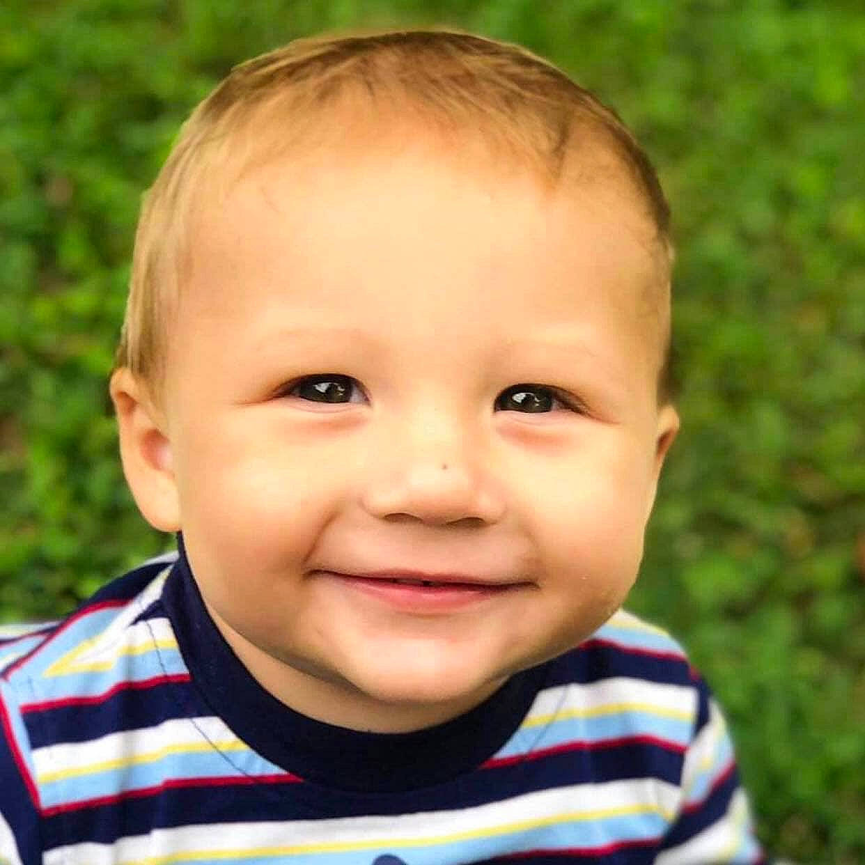 Colby joined the competition — help win amazing prizes! baby, cheek, child, chin, close_up, eye, eyebrow, face, facial_expression, forehead, grass, head, joy, lip, male, nose, person, portrait, portrait_photography, skin