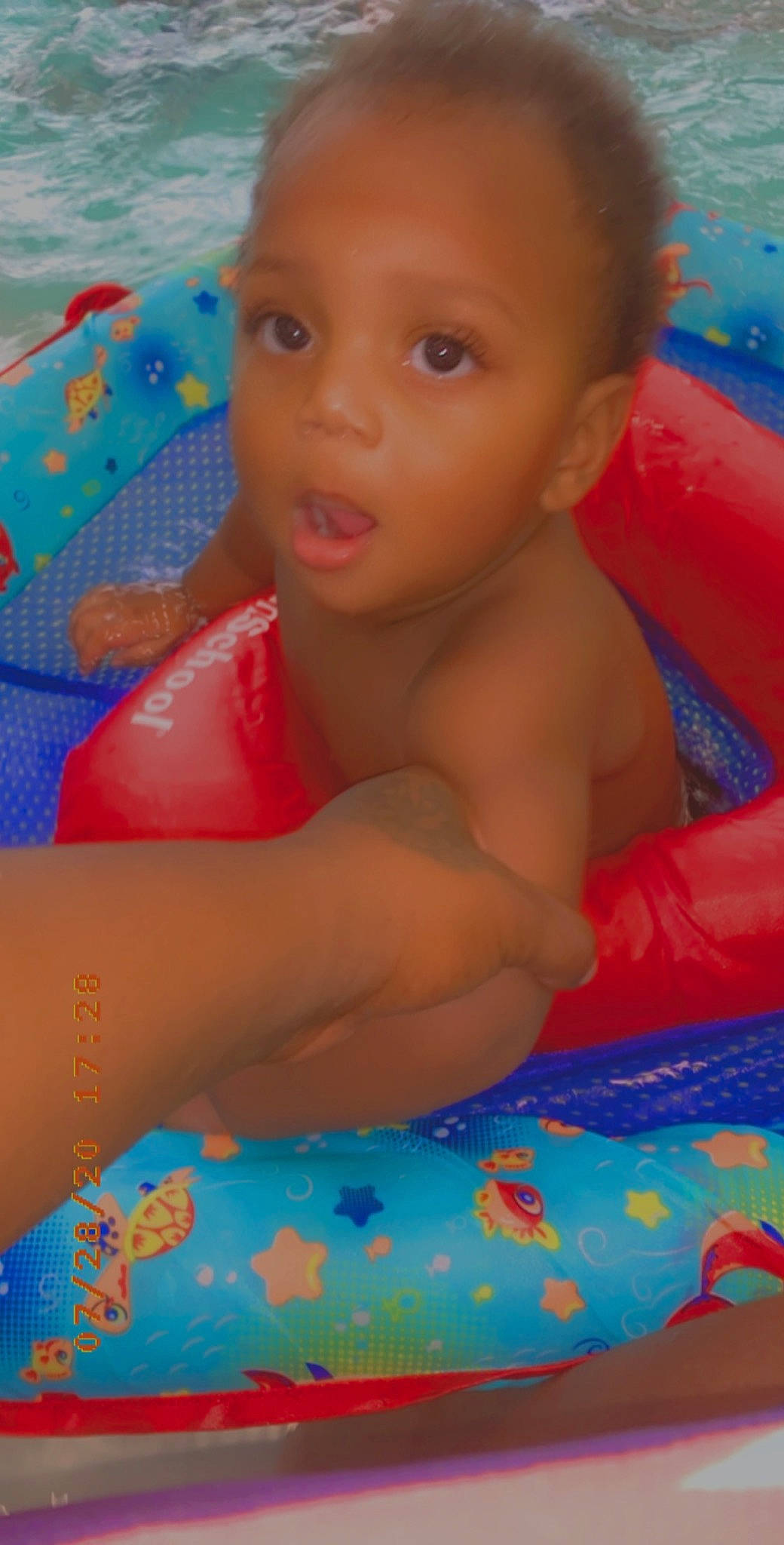 David is registered to the contest to win money with this photo: baby, baby_products, bathing, cheek, child, eye, fun, games, inflatable, iris, leisure, lip, mouth, nose, person, play, product, skin, surprise, toddler