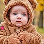 Miles is registered to the contest to win money with this photo: autumn, baby, bear, blue_eyes, child, costume, cute, face, fall, fuzzy, gloves, hood, leaves, nature, outdoor, portrait, seasonal, soft_texture, toddler, warm_clothing