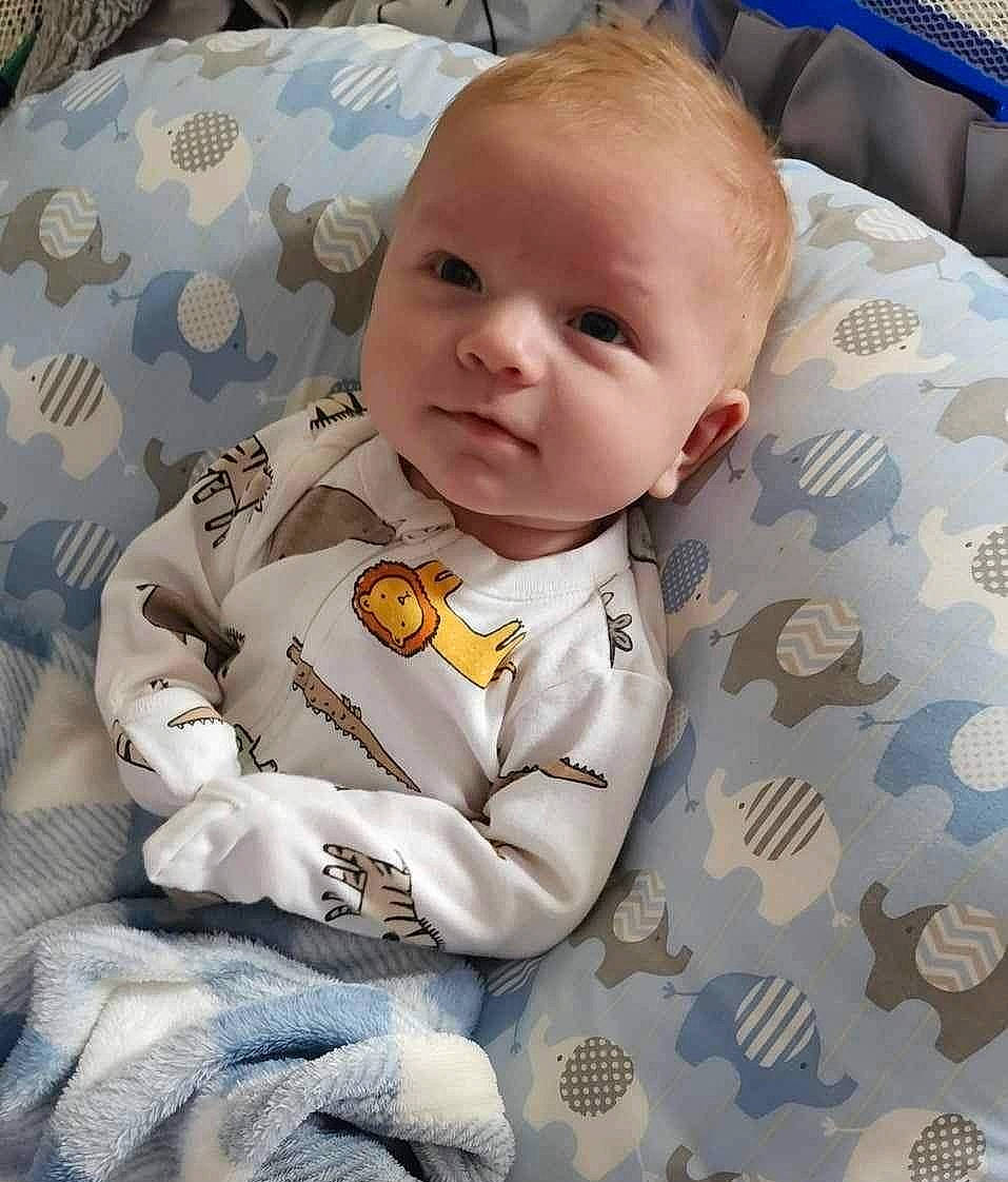 Canton joined the competition — help win amazing prizes! baby, baby_products, baby_toddler_clothing, bedding, cheek, child, collar, comfort, dress_shirt, face, flooring, head, linens, pattern, person, sitting, skin, sleeve, t_shirt, textile