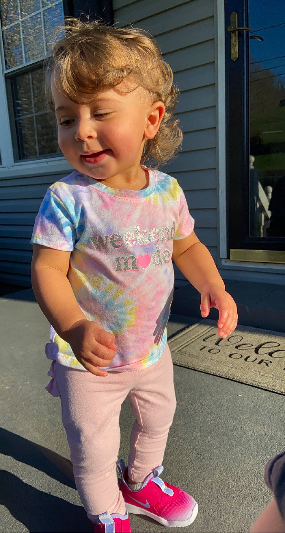 Sophia is registered to the contest to win money with this photo: baby_toddler_clothing, child, cool, face, facial_expression, fun, hairstyle, happy, joint, leisure, mouth, nose, person, pink, sleeve, smile, standing, summer, t_shirt, toddler