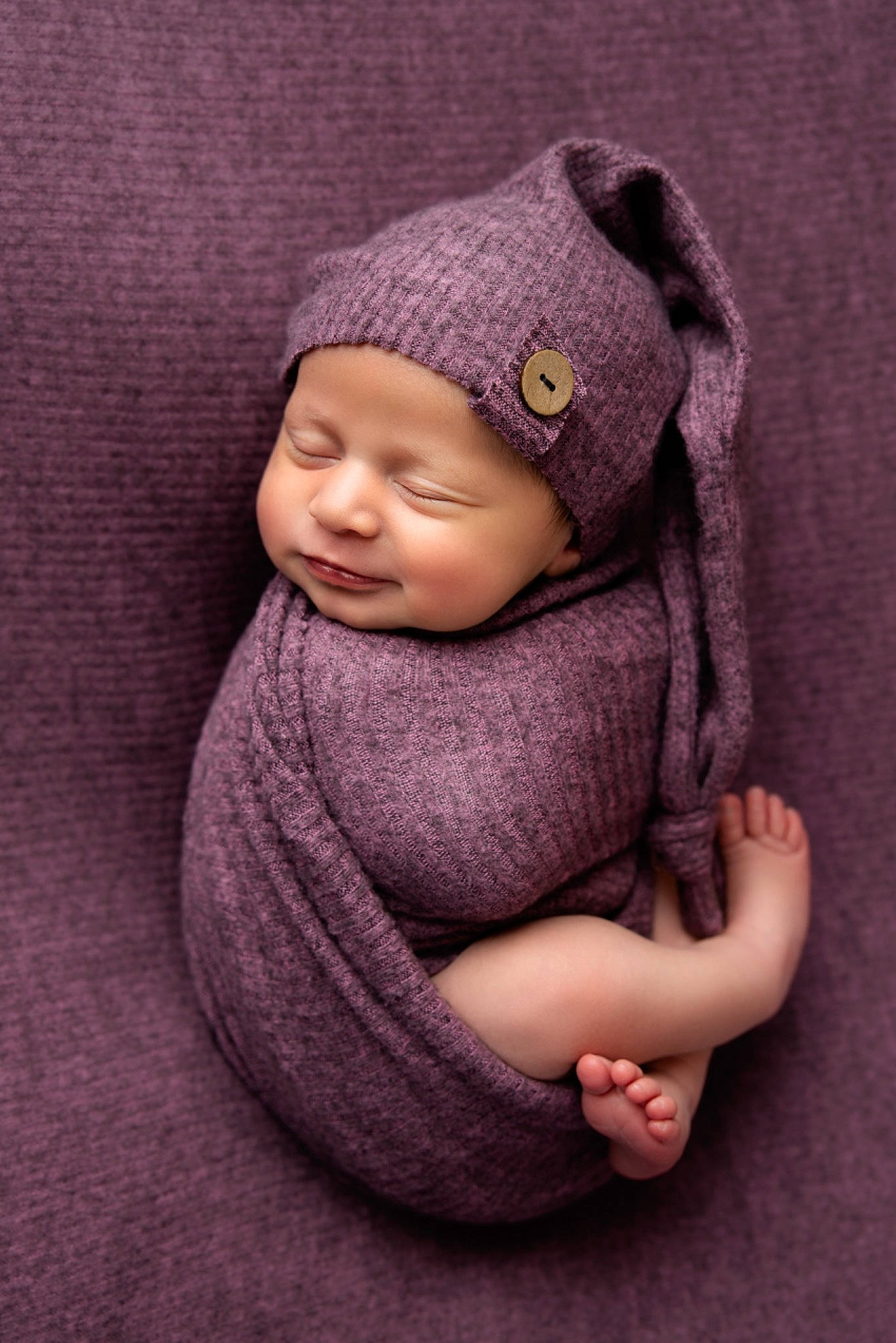 Estella joined the competition — help win amazing prizes! arm, baby, baby_products, baby_toddler_clothing, beanie, cap, cheek, child, fashion_accessory, finger, grey, hat, headwear, knit_cap, lip, person, purple, sleeve, thumb, toddler