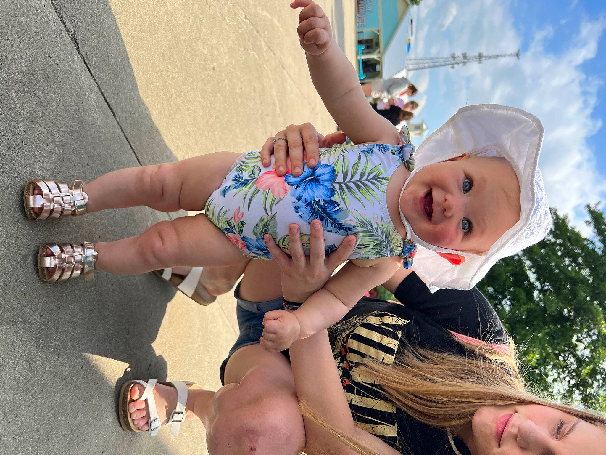 Rosalie is registered to the contest to win money with this photo: child, foot, fun, grass, happy, hat, human_leg, joy, knee, leg, leisure, person, pink, recreation, sandal, shorts, sun_hat, sunglasses, thigh, toddler