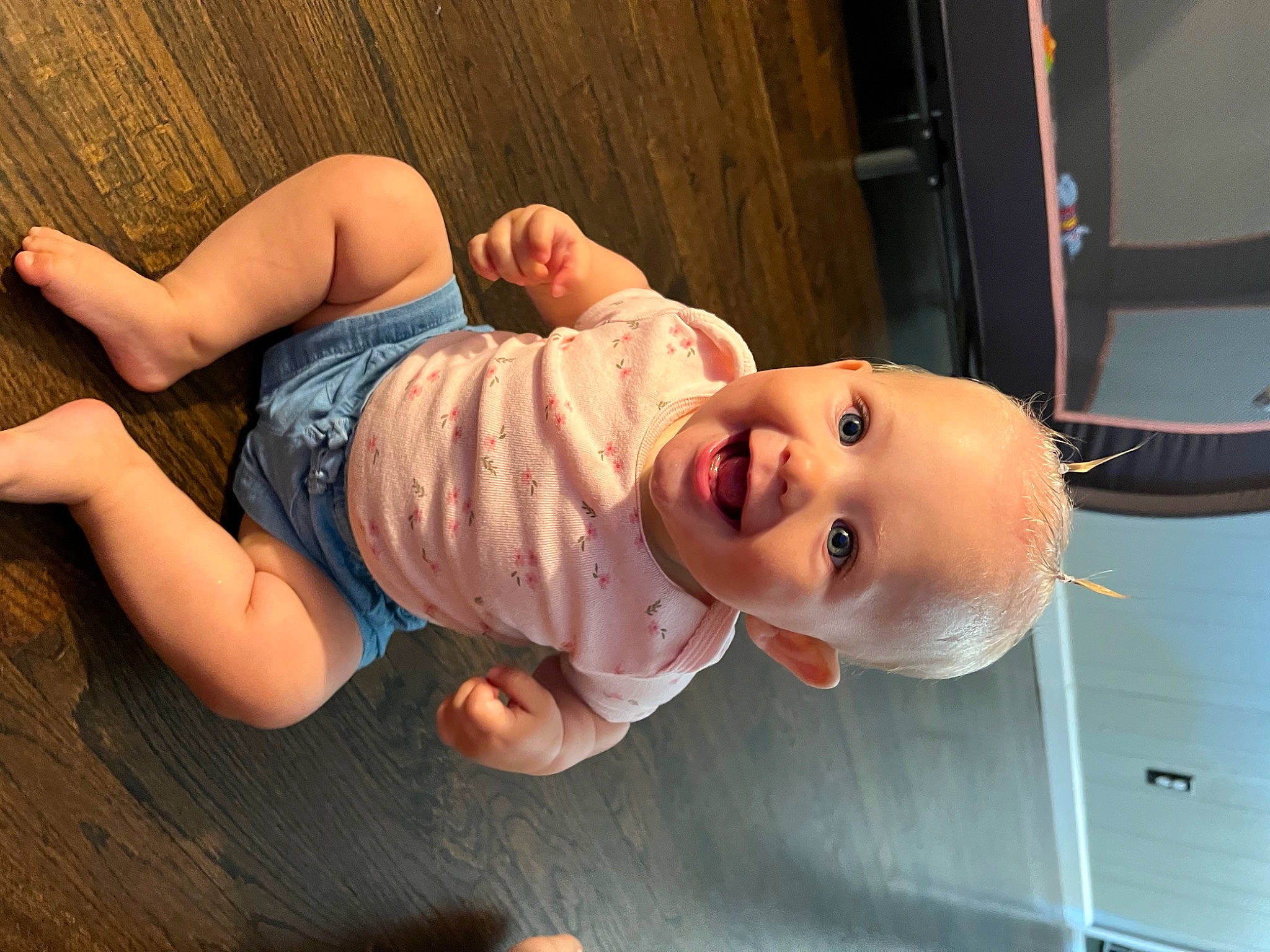 Rosalie is registered to the contest to win money with this photo: baby, baby_toddler_clothing, cheek, comfort, elbow, eye, finger, fun, hairstyle, happy, human_body, lip, mammal, mouth, nose, person, skin, smile, standing, toddler