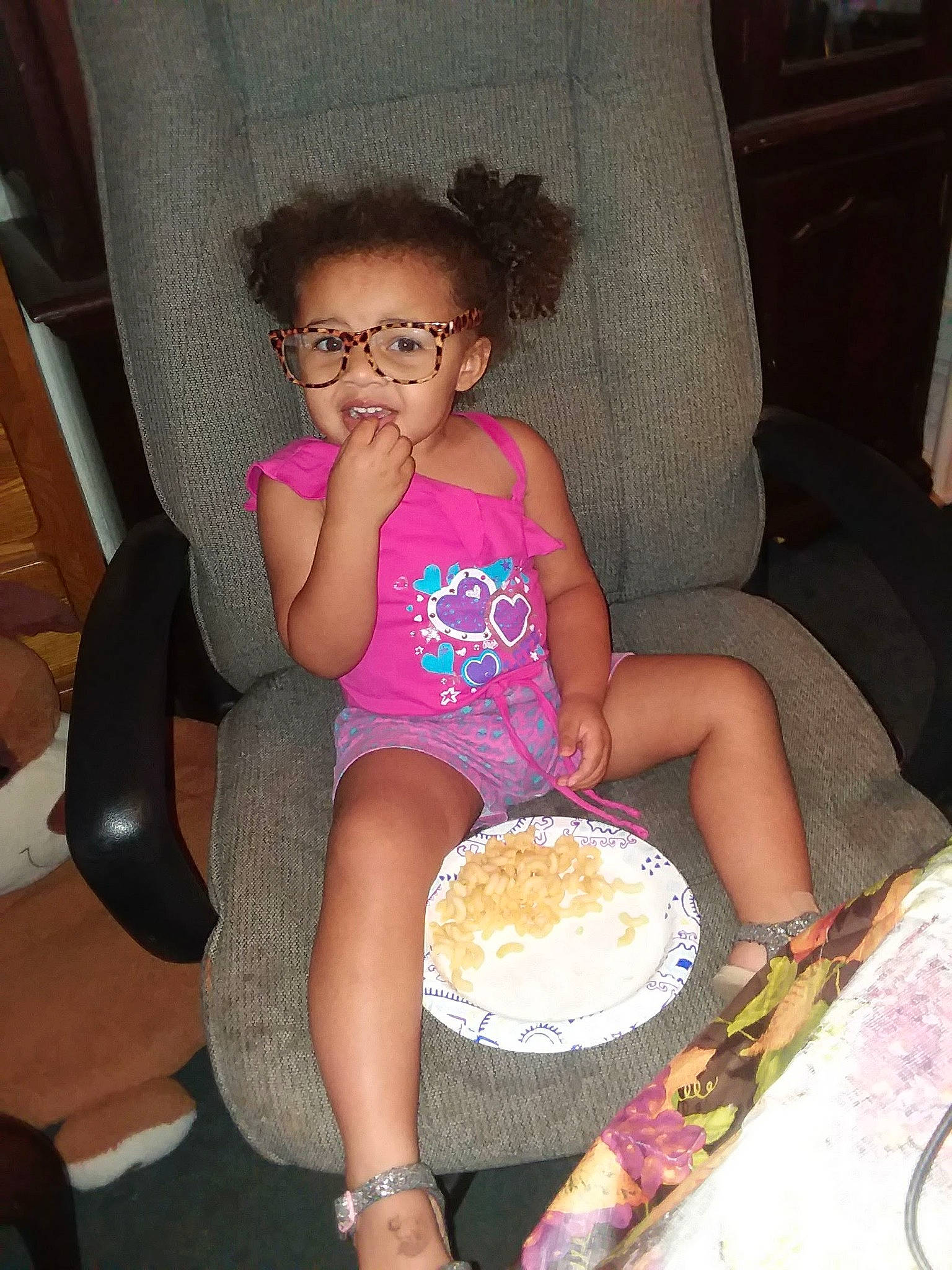 Ava joined the competition — help win amazing prizes! baby_toddler_clothing, birthday_cake, chair, child, comfort, cooking, couch, eyewear, food, fun, glasses, human_leg, lap, person, recipe, sitting, sunglasses, tableware, thigh, toddler