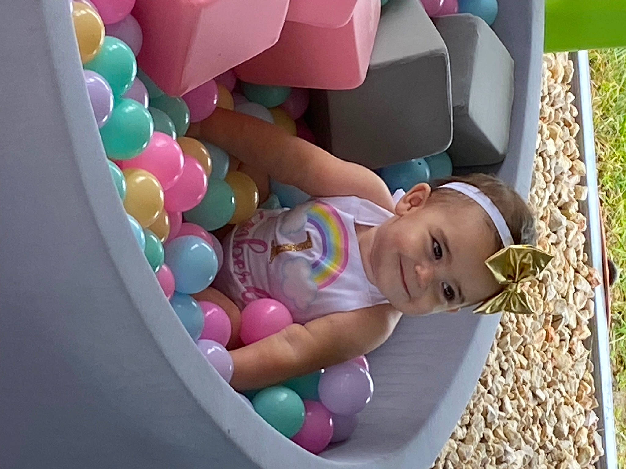 Emberly is registered to the contest to win money with this photo: baby, baby_products, baby_toddler_clothing, baby_toys, balloon, car_seat, child, circle, fun, happy, headwear, joy, leisure, magenta, party_supply, pattern, person, pink, play, recreation