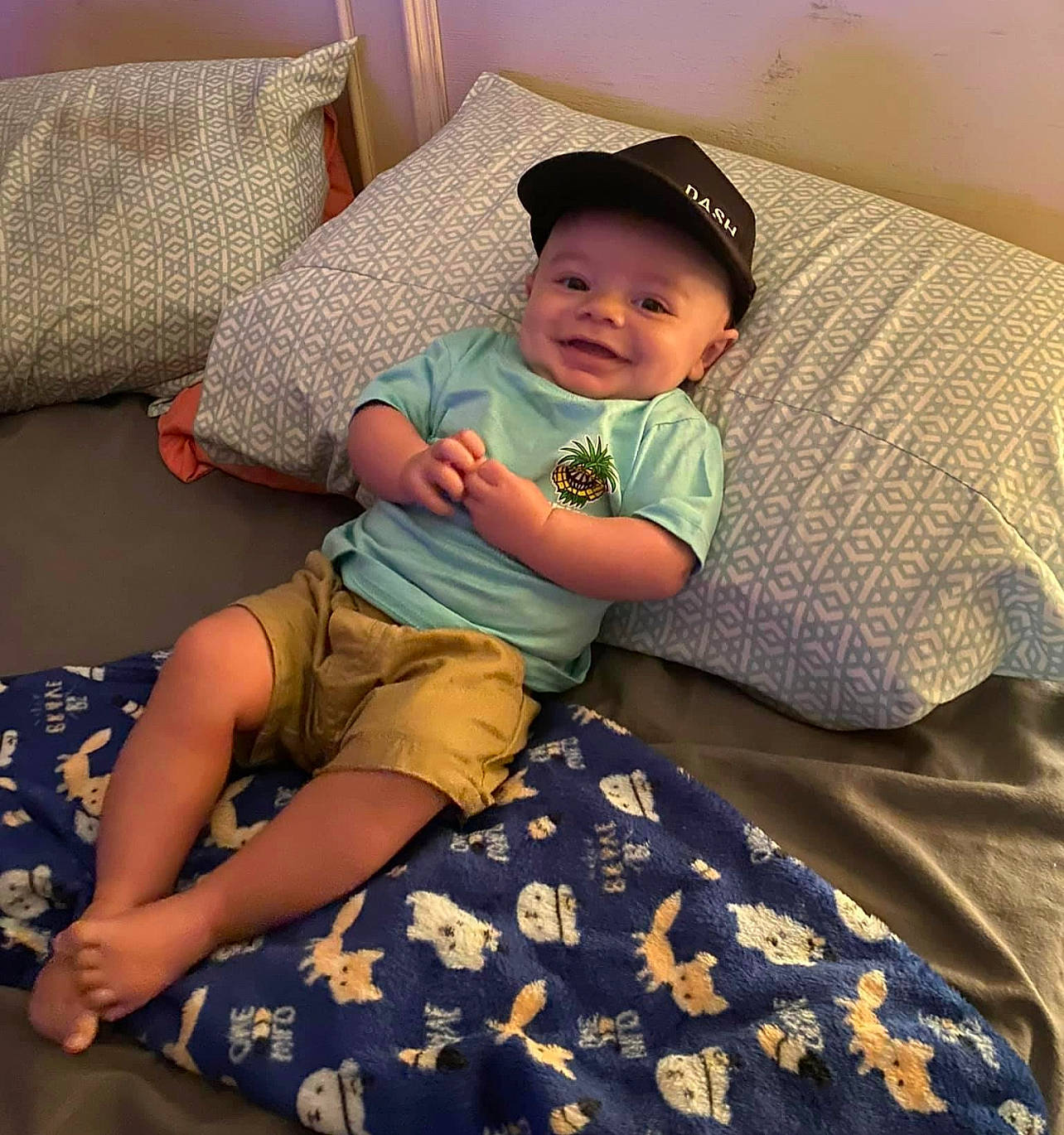 Reyson joined the competition — help win amazing prizes! baby, baby_toddler_clothing, baseball_cap, cap, child, comfort, cool, couch, electronic_device, happy, hat, headwear, joy, lap, living_room, mammal, person, sleeve, t_shirt, textile