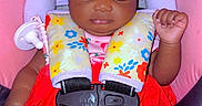 Kaylee is registered to the contest to win money with this photo: baby, infant, child, car_seat, headband, pink_clothing, red_skirt, sleeping, smiling, colorful, collage, closeup, cute, patterned_fabric, foot, pacifier_clip, soft_toys, happy, portrait, indoors