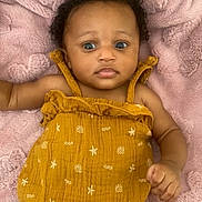 A Daya is registered to the contest to win money with this photo: baby, babylaughing, blanket, bodypart, clothing, cushion, face, finger, hair, hand, happy, head, homedecor, newborn, person, photography, portrait, quilt, sitting, smile