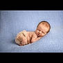 baby, newborn, sleeping, infant, blue_blanket, knitted_shorts, peaceful, soft_texture, portrait, cute, child, resting, skin, lying_down, small, cozy, peace, toddler, indoors, closeup