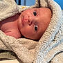 Noah joined the competition — help win amazing prizes! baby, towel, infant, wrapped, face, skin, eyes, closeup, newborn, soft, texture, blanket, cute, child, portrait, indoors, expression, head, resting, warm
