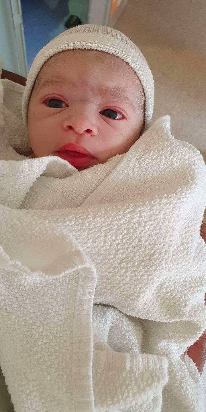 Ismaël a rejoint le concours — aidez-le/la à gagner de superbes lots ! baby, baby_toddler_clothing, beige, cheek, child, chin, comfort, eye, eyebrow, face, headgear, iris, lip, neck, outerwear, person, skin, sleeve, textile, toddler