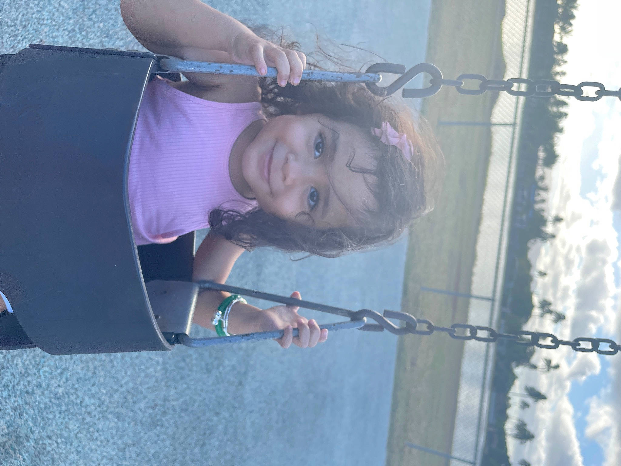 Nyla joined the competition — help win amazing prizes! blue, elbow, electric_blue, fence, fun, happy, joy, knee, leisure, person, recreation, sky, smile, thigh, vacation, water, wire, wire_fencing