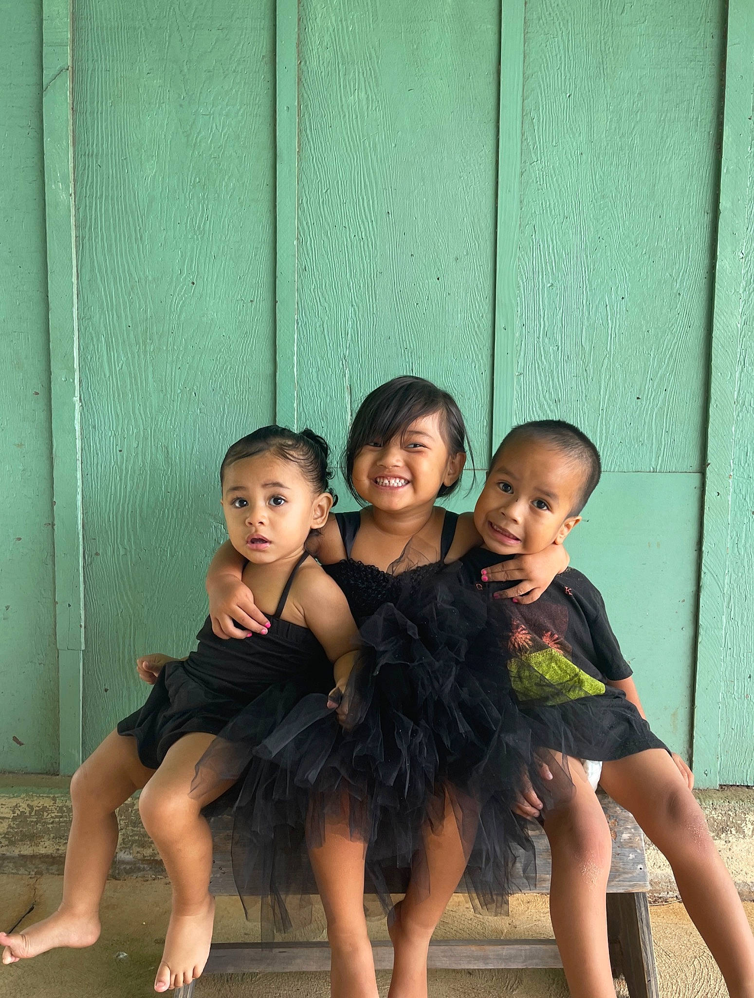 Nyla is registered to the contest to win money with this photo: barefoot, child, dress, event, flash_photography, foot, formal_wear, fun, happy, joy, leg, leisure, people_in_nature, person, plant, shoulder, skin, smile, standing, surprise