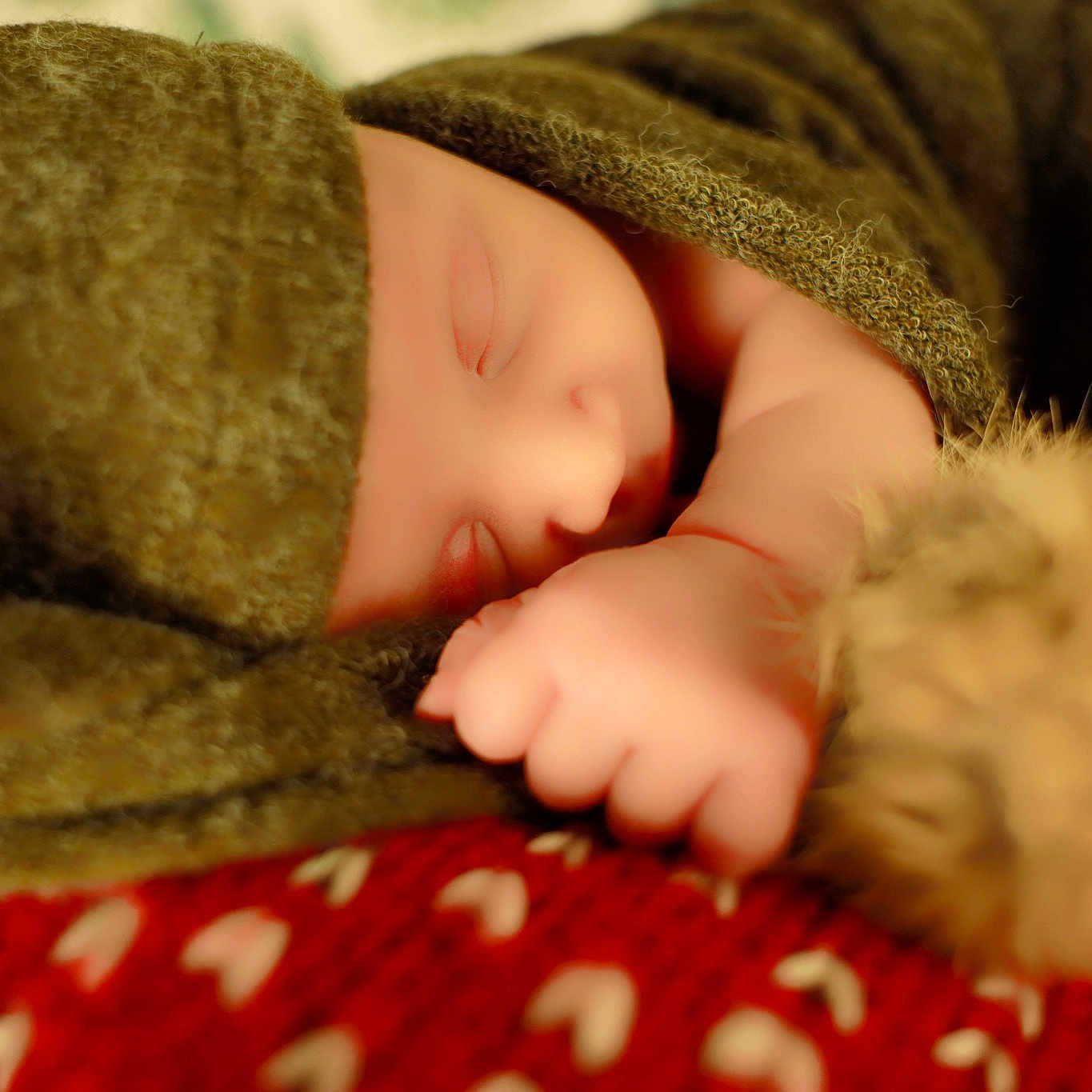 Billy is registered to the contest to win money with this photo: baby, baby_sleeping, baby_toddler_clothing, bedtime, carmine, comfort, flesh, fur, gesture, human_leg, linens, nail, nap, pattern, room, skin, thumb, toddler, wood, wool