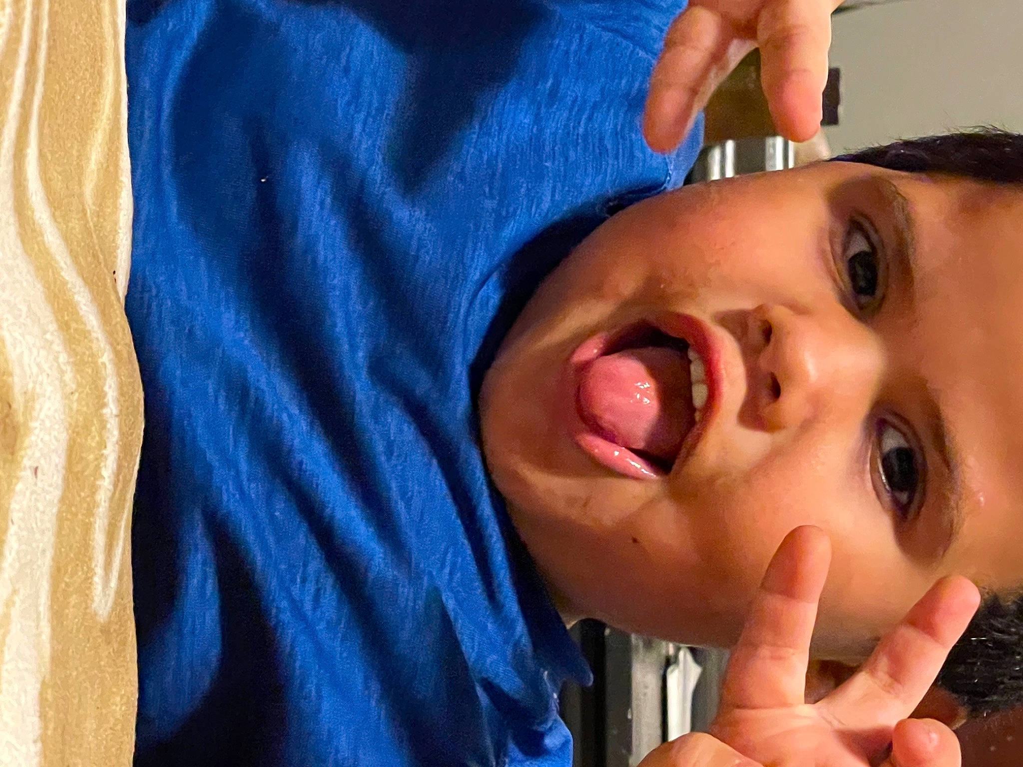 Miguel is registered to the contest to win money with this photo: arm, cheek, chin, ear, eye, eyebrow, eyelash, finger, forehead, gesture, hand, head, jaw, lip, mouth, neck, nose, person, skin, sleeve