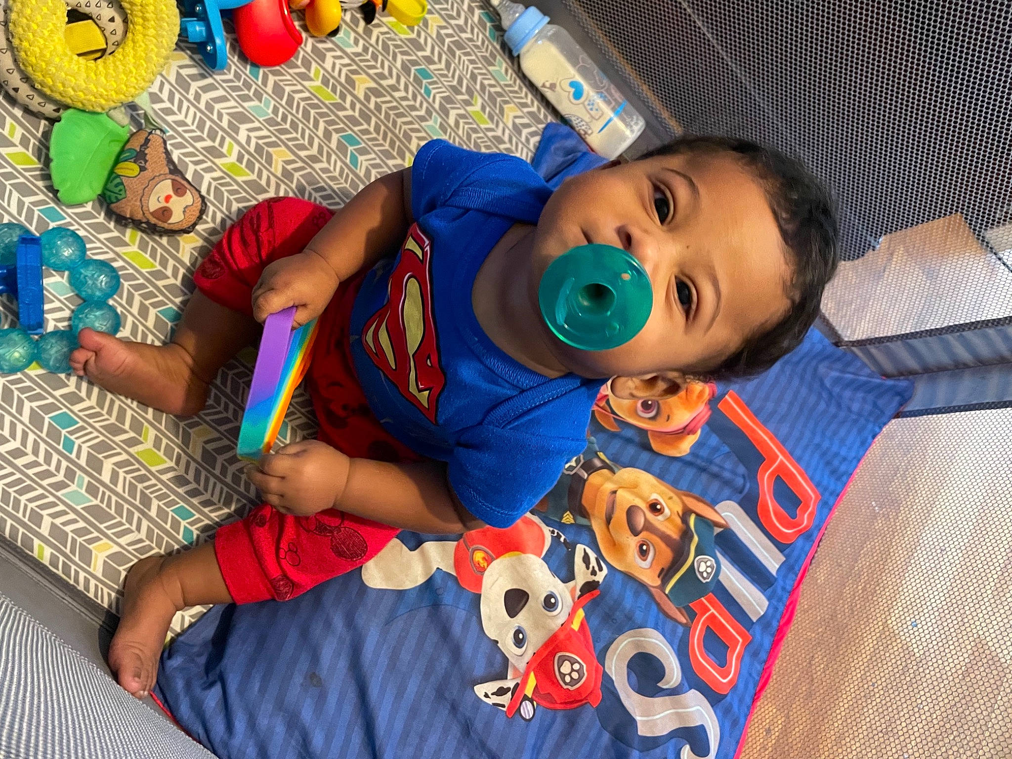 Cristian joined the competition — help win amazing prizes! art, baby, baby_products, baby_toddler_clothing, blue, child, electric_blue, flooring, fun, happy, leisure, linens, orange, pattern, person, play, red, smile, t_shirt, textile