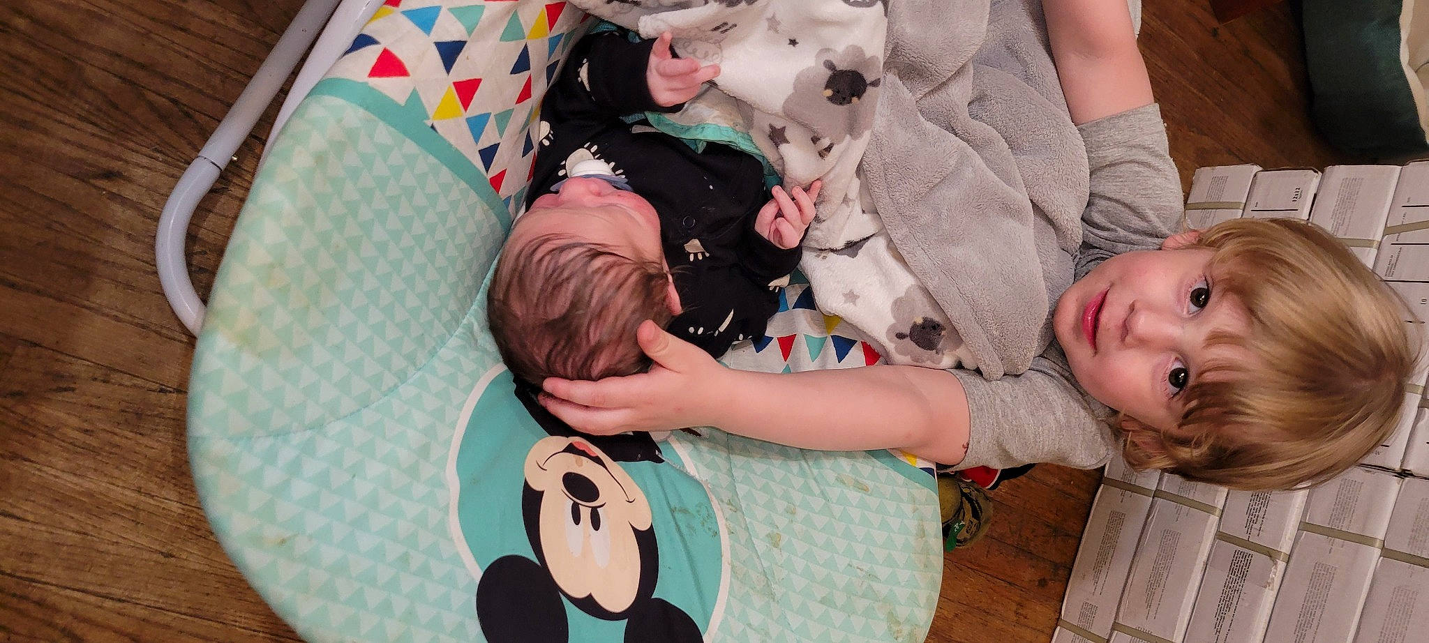 Koopper is registered to the contest to win money with this photo: baby, baby_products, baby_toddler_clothing, child, comfort, event, fun, grass, green, happy, lap, leisure, mammal, pattern, people, person, play, sitting, textile, toddler