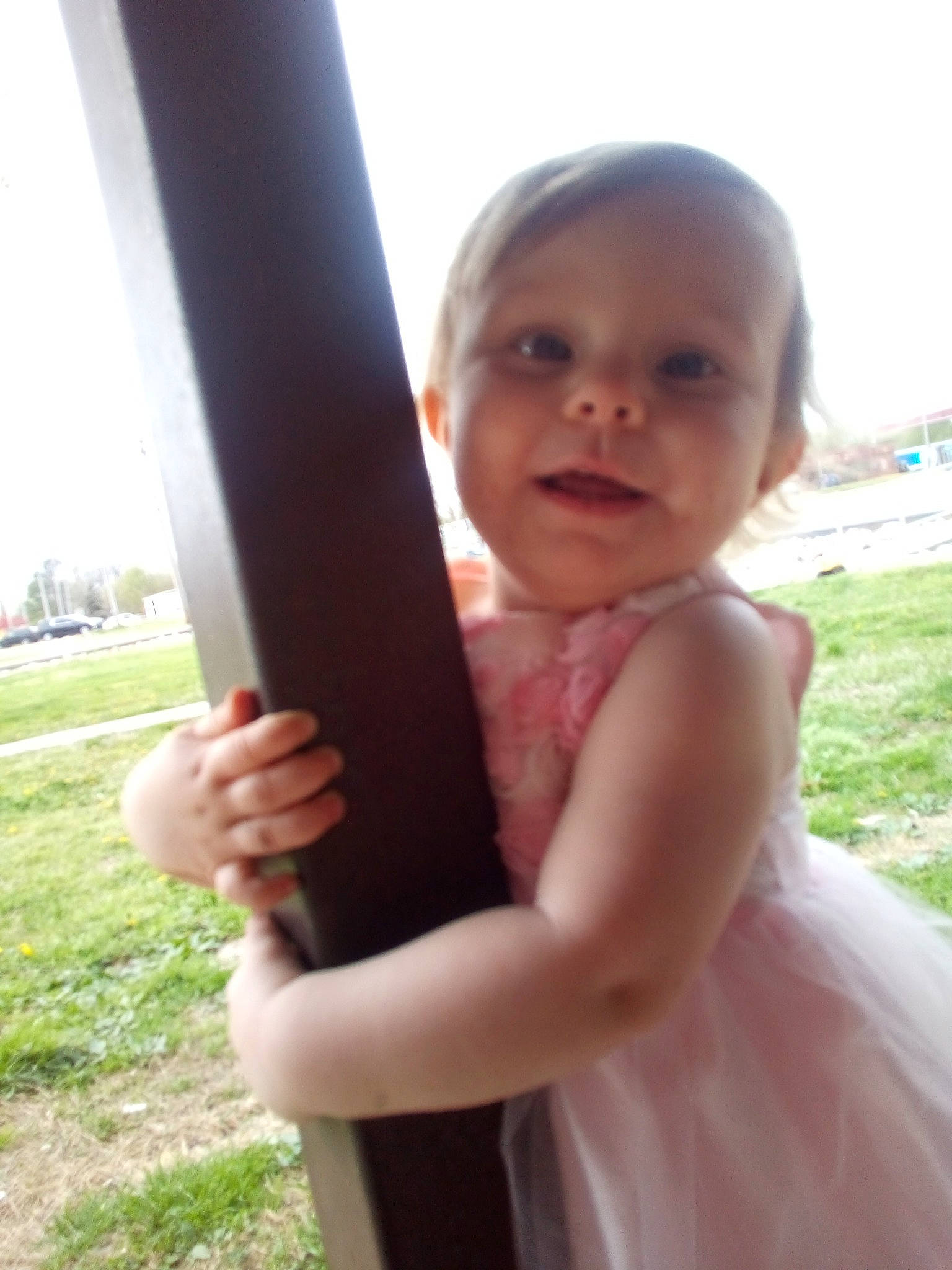 Faith is registered to the contest to win money with this photo: baby, child, dress, finger, grass, hand, happy, person, skin, smile, standing, summer, thumb, toddler, vacation