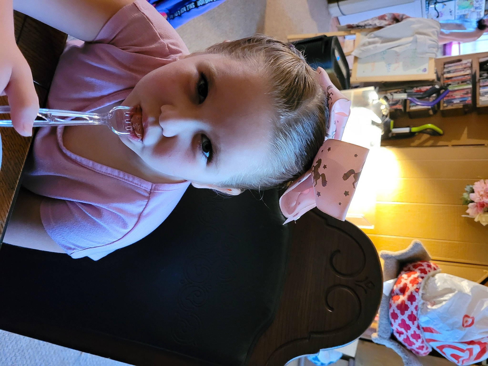 Breanna is registered to the contest to win money with this photo: baby, baby_products, baby_toddler_clothing, bookcase, cheek, child, flower, fun, happy, mouth, person, play, room, shelf, shelving, sitting, smile, t_shirt, toddler, toy