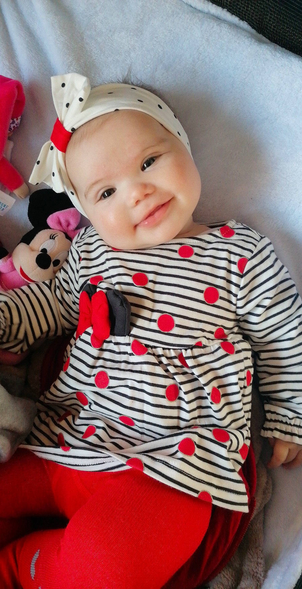 Jéléna participe au concours pour gagner de l'argent avec cette photo : arm, baby, baby_toddler_clothing, cheek, child, collar, dress_shirt, eye, face, happy, headwear, joy, pattern, person, pink, plaid, skin, sleeve, smile, t_shirt