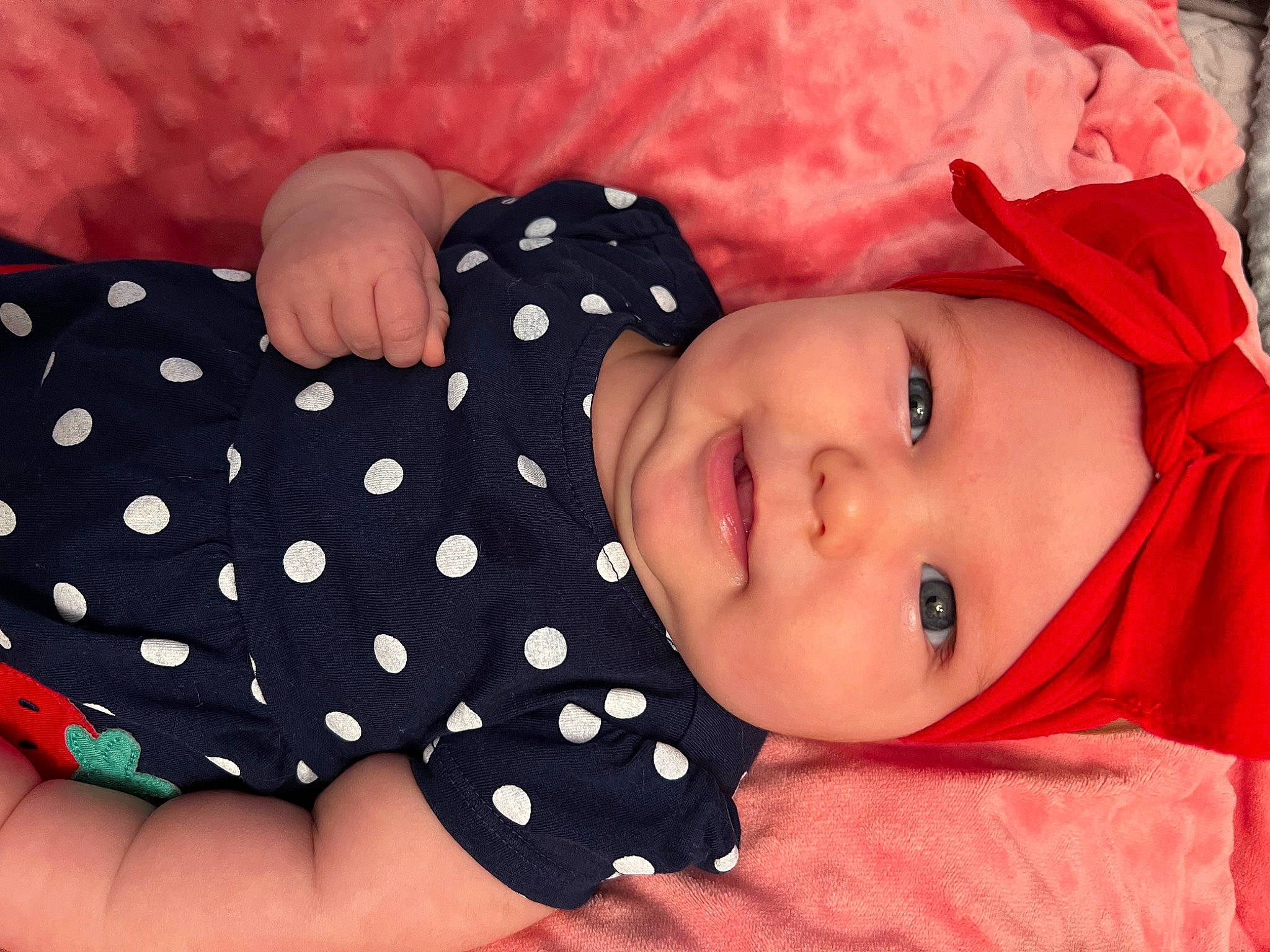 Eliza joined the competition — help win amazing prizes! baby, baby_products, baby_toddler_clothing, beauty, cheek, child, comfort, happy, hat, headwear, lip, mammal, pattern, person, pink, plaid, product, skin, sleeve, smile