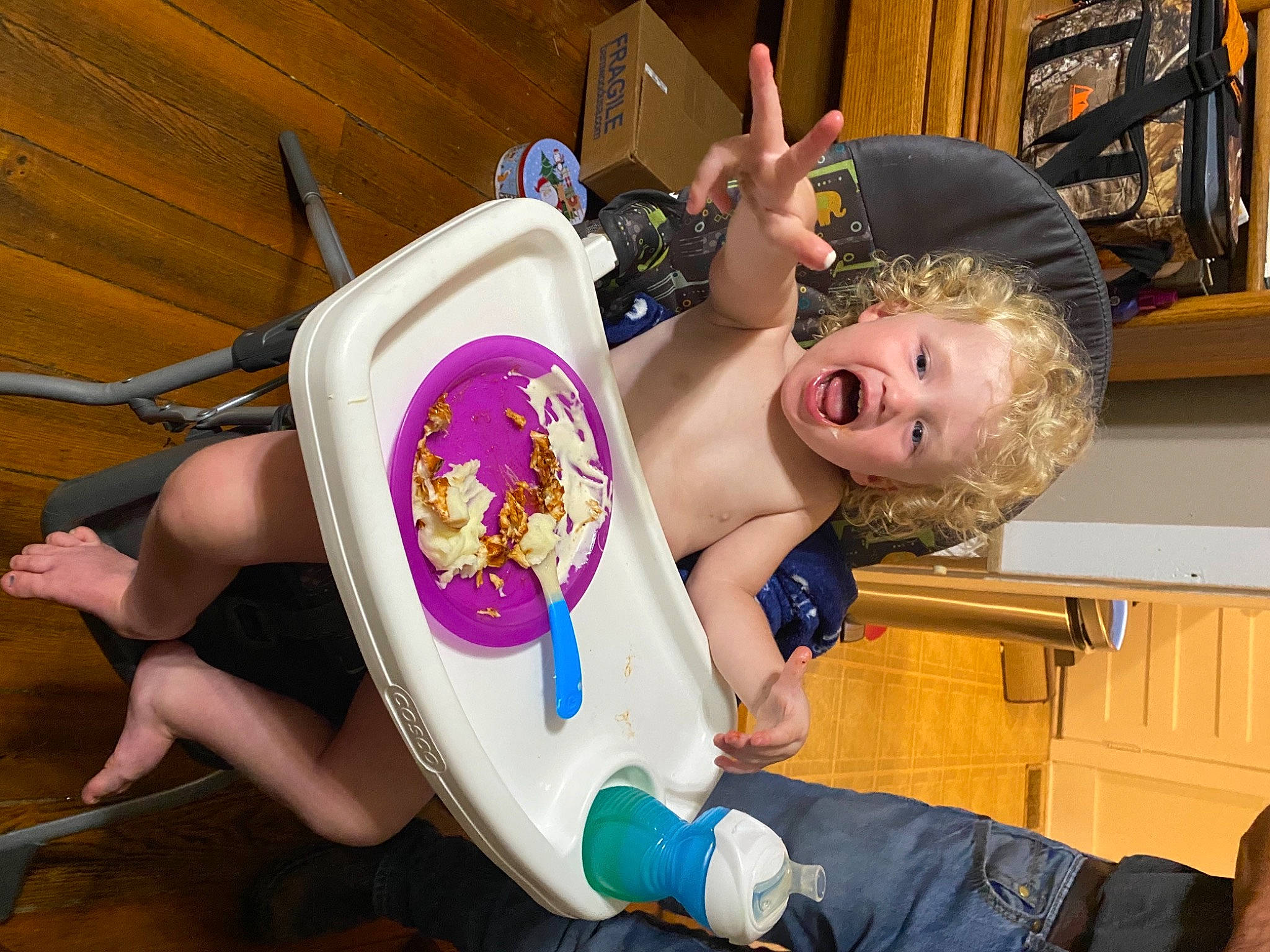 Karson is registered to the contest to win money with this photo: baby_products, chair, chest, child, flesh, fun, happy, human_leg, knee, leisure, magenta, mouth, nail, person, recreation, room, sitting, smile, thigh, tire
