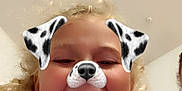 Addie joined the competition — help win amazing prizes! child, face, tongue, dog_filter, blonde_hair, curly_hair, smiling, indoor, playful, person, closeup, filter, digital_effect, happy, cute, head, young, fun, expression, casual