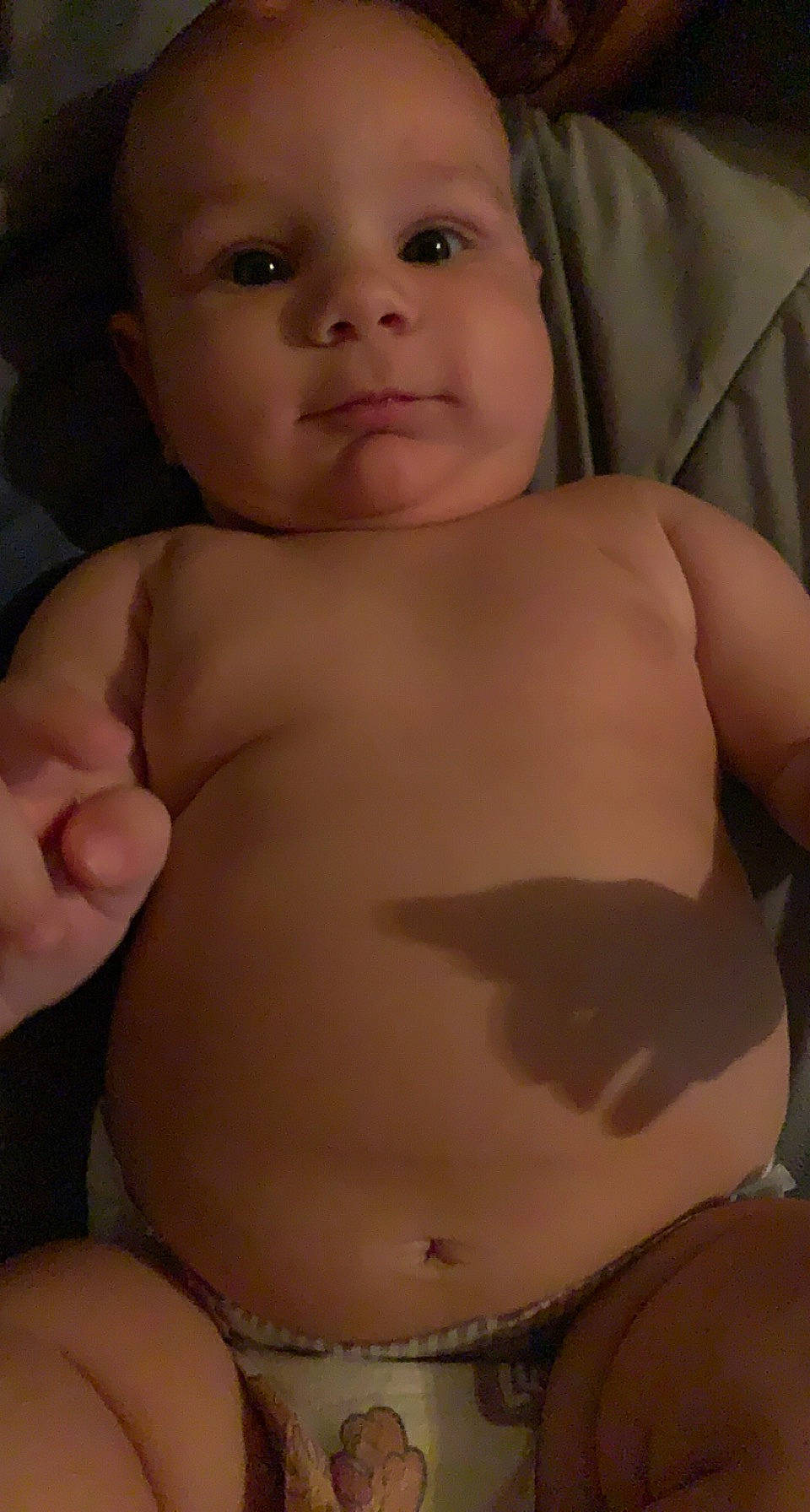 Khamari is registered to the contest to win money with this photo: arm, baby, cheek, chest, eyebrow, eyelash, finger, gesture, human_body, iris, joint, lip, mouth, muscle, organ, person, skin, stomach, thigh, thumb