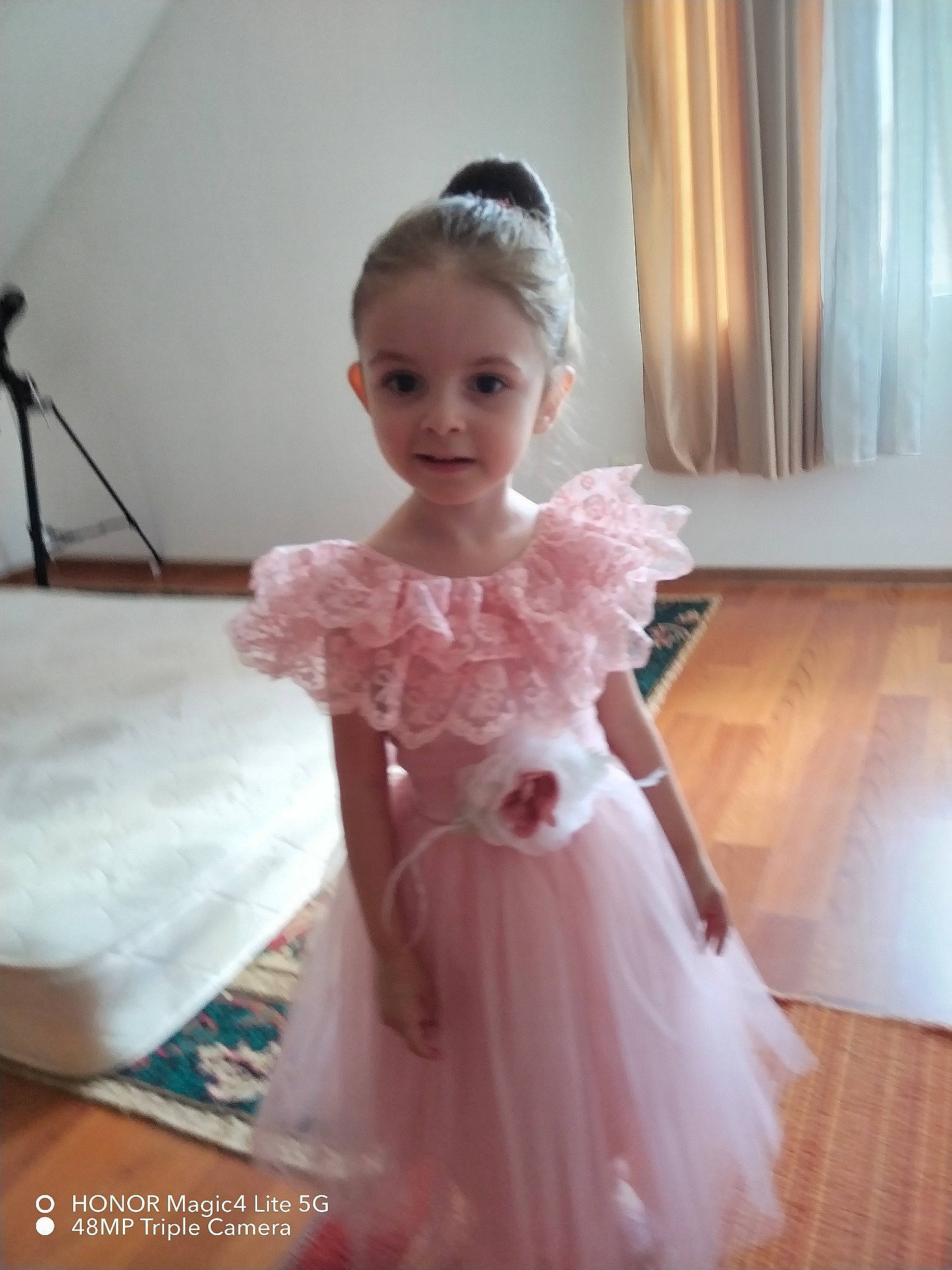 Vanessa Maria participe au concours pour gagner de l'argent avec cette photo : baby_toddler_clothing, bridal_accessory, bridal_clothing, bridal_party_dress, curtain, day_dress, dress, embellishment, fashion_design, formal_wear, gown, happy, headpiece, iris, one_piece_garment, person, petal, pink, sleeve, smile