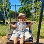 Gennaro participe au concours pour gagner de l'argent avec cette photo : boy, chain, child, cushion, fence, garden, grass, happy, hat, outdoor, playground, shoes, shorts, smiling, socks, sunny, swing, trees, tshirt, wooden_swing