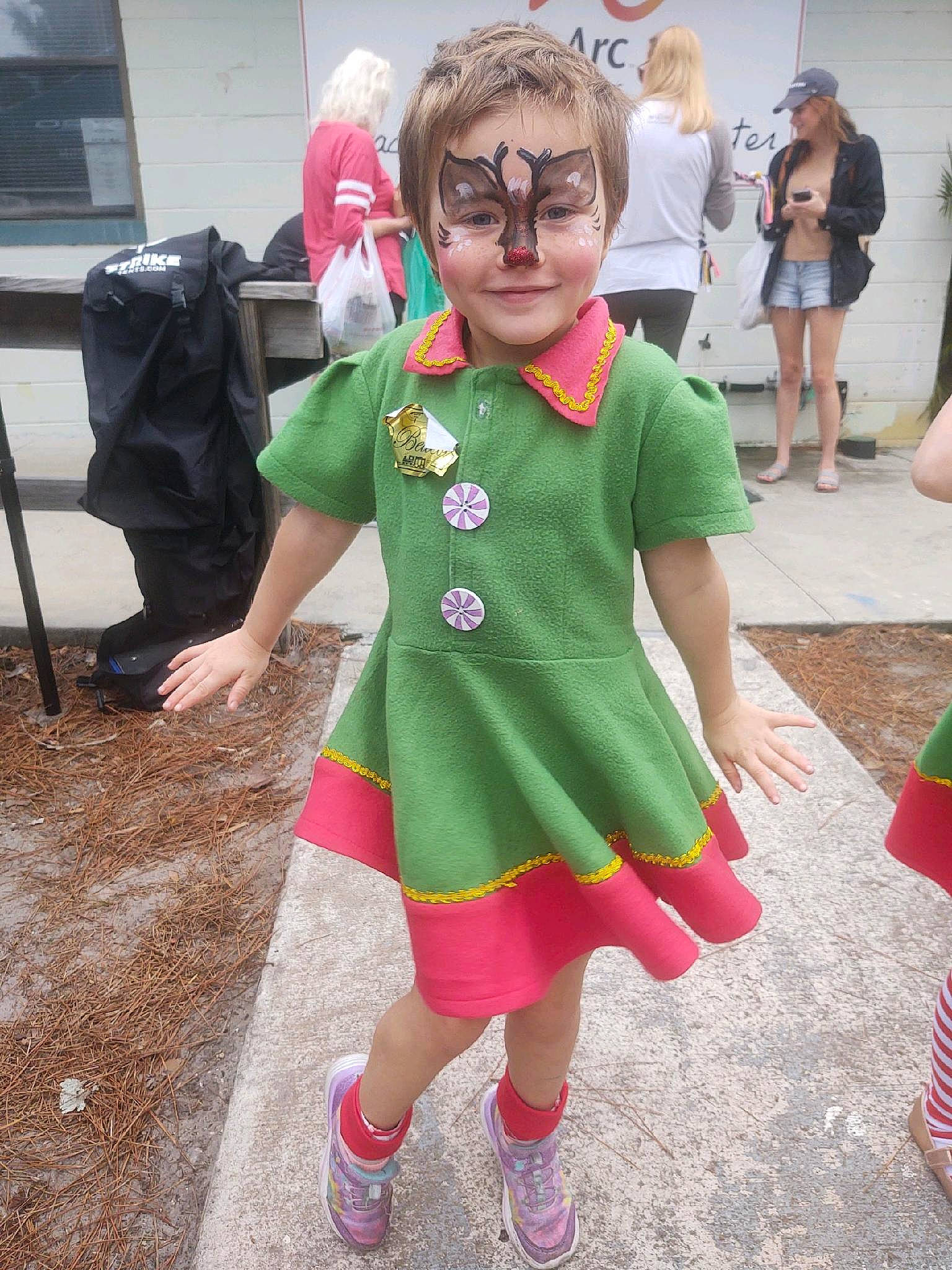 Magnolia is registered to the contest to win money with this photo: bag, child, event, eyewear, fashion_design, fictional_character, flooring, footwear, fun, happy, headwear, human_leg, joy, luggage_and_bags, magenta, pattern, person, pink, recreation, shoe