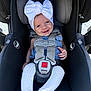 Makenzie is registered to the contest to win money with this photo: baby, infant, child, smiling, car_seat, uppababy, white_bow, headwrap, safety_harness, buckle, blue_outfit, knitted_tights, legs, hand, face, portrait, stroller, cute, cozy, outdoor