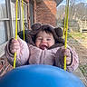 Oaklynne joined the competition — help win amazing prizes! baby, child, swing, jacket, pink, blue, outdoor, play, happy, smile, ropes, winter_clothing, porch, yard, brick_wall, person, headwear, fun, cute, toddler
