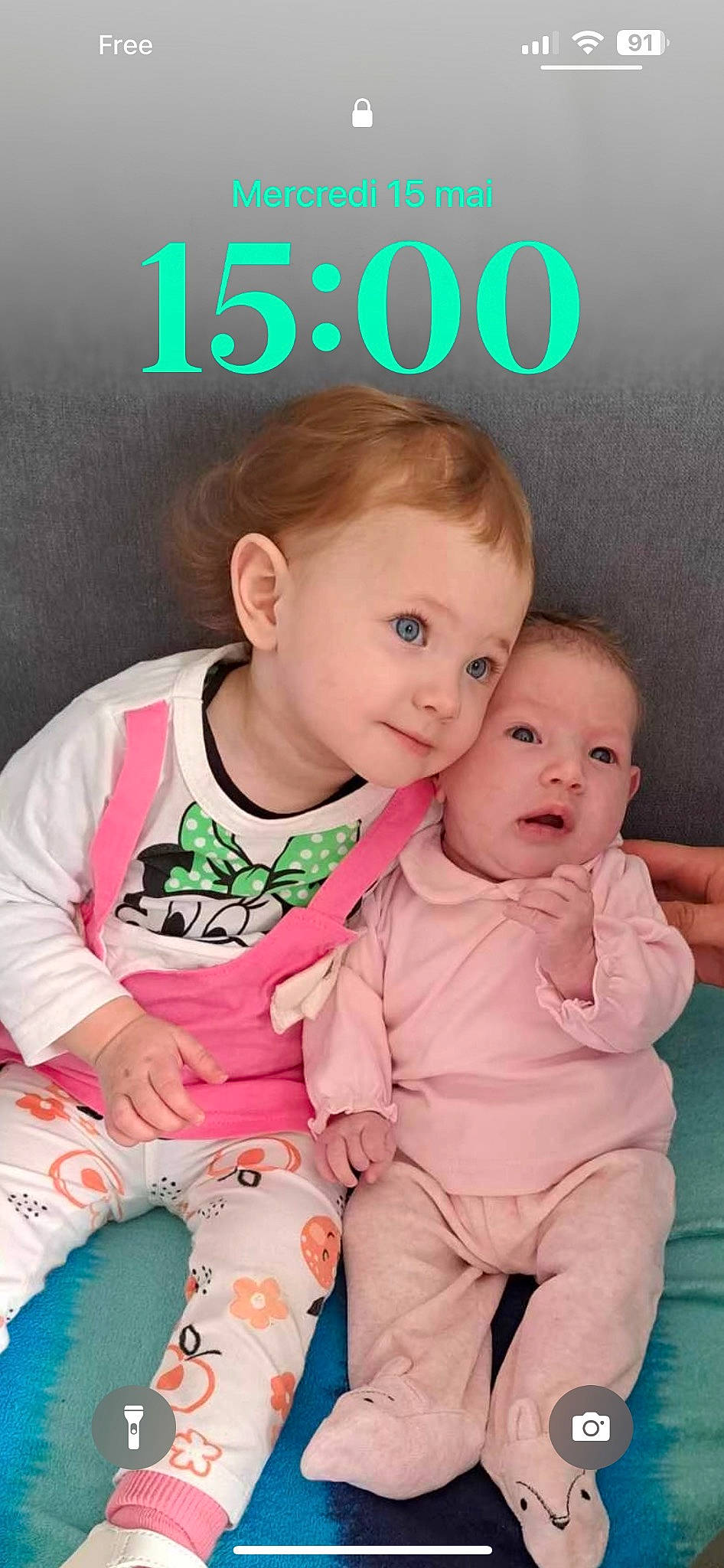 Delya participe au concours pour gagner de l'argent avec cette photo : baby, baby_toddler_clothing, cheek, child, chin, eye, face, fun, gesture, hairstyle, happy, head, nose, person, pink, product, skin, sleeve, smile, t_shirt