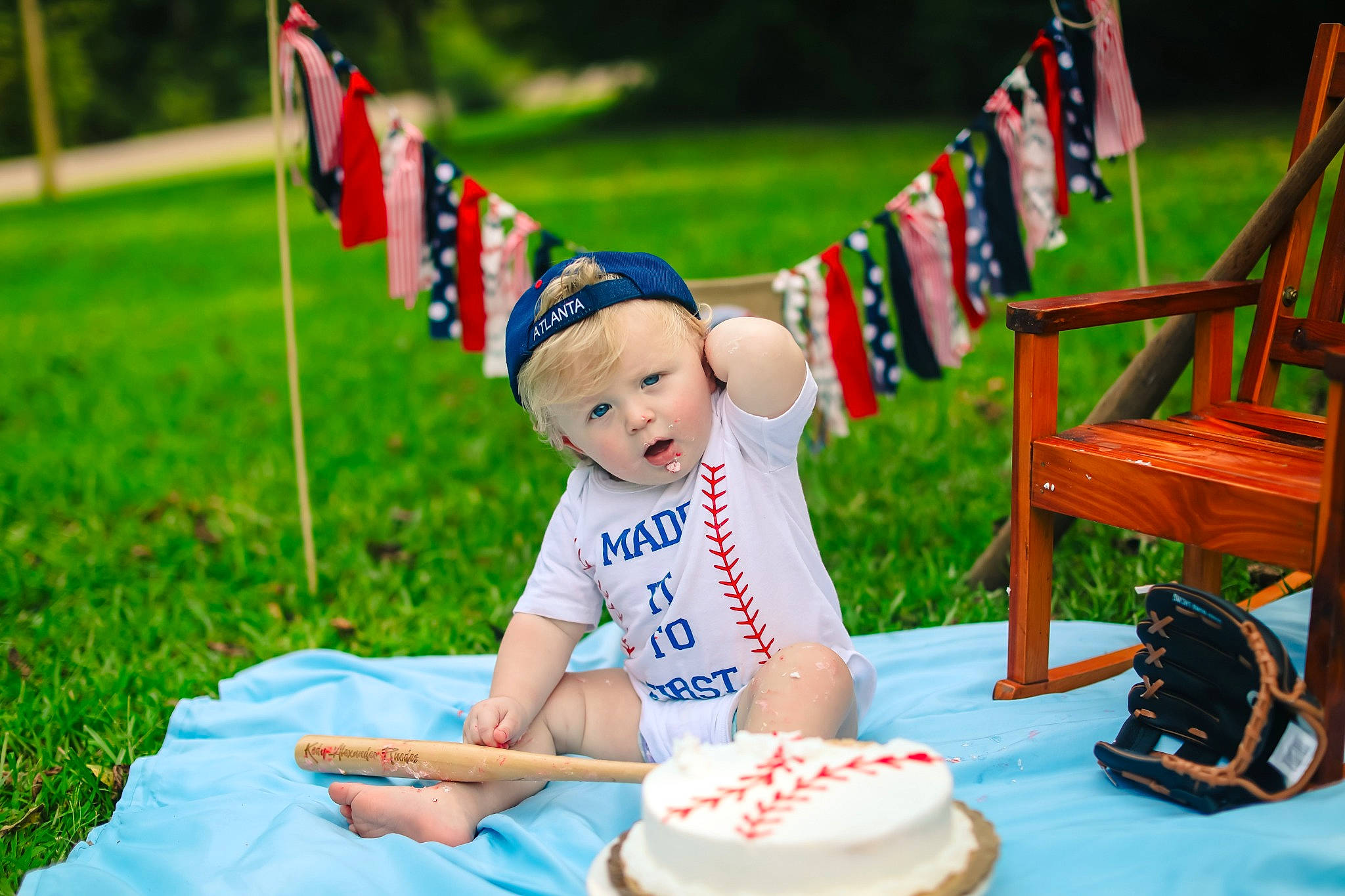 Kody joined the competition — help win amazing prizes! baby, blue, cake, cake_decorating_supply, child, event, flag, flag_of_the_united_states, food, fun, grass, green, happy, headwear, icing, leisure, person, plant, recreation, sugar_cake