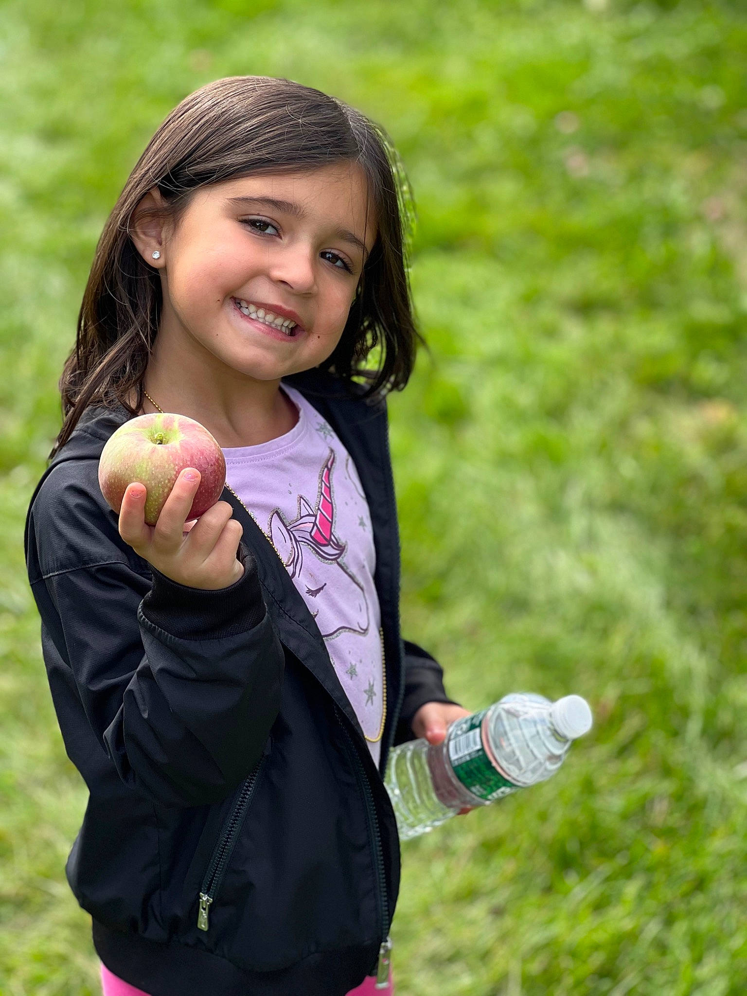 Kyah joined the competition — help win amazing prizes! apple, ball, bottle, child, face, food, fruit, fun, gesture, grass, grass_family, grassland, happy, joy, leisure, people_in_nature, person, plant, recreation, smile