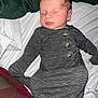 baby, bed, blanket, child, cozy, cute, human, indoors, infant, newborn, onesie, peaceful, person, plaid_blanket, portrait, resting, sleep, sleeping, soft, striped_clothing