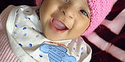 Elham joined the competition — help win amazing prizes! baby, beanie, bodypart, bonnet, cap, clothing, coat, face, glove, happy, hat, head, jacket, laughing, mouth, newborn, person, photography, portrait, smile