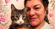 Pepito joined the competition — help win amazing prizes! cat, celebration, close_up, earring, floral_frame, flower, gift, happy, heart, holding, love, mother, necklace, pet, pink, portrait, smile, tabby_cat, text_overlay, woman
