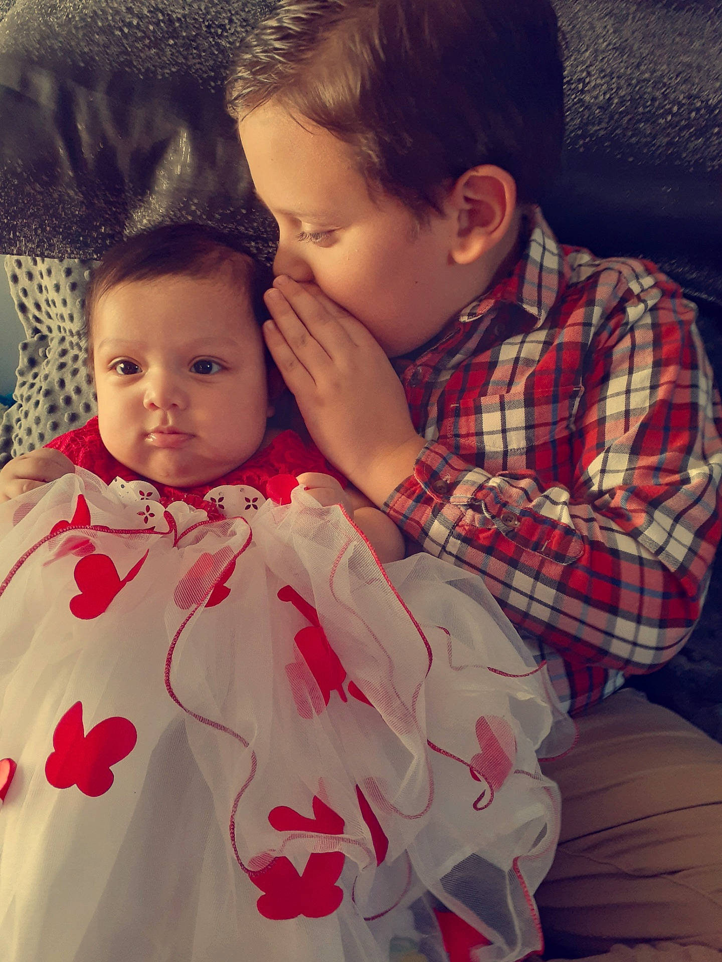 Carmella joined the competition — help win amazing prizes! beauty, cheek, child, eye, face, forehead, happy, head, hug, human, interaction, joy, lip, love, mother, nose, outerwear, person, plaid, skin