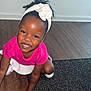 Tiana is registered to the contest to win money with this photo: accessories, baby, babycrawling, child, clothing, crawling, face, female, footwear, girl, happy, hardwood, head, person, photography, portrait, shoe, sitting, smile, wood
