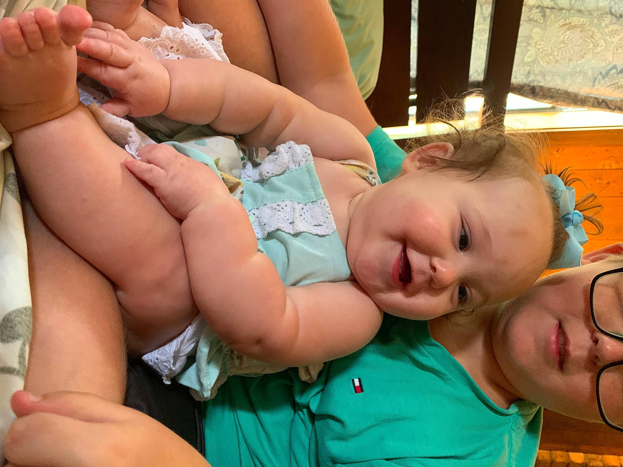 Jordyn is registered to the contest to win money with this photo: arm, chest, child, finger, grass, hand, happy, headwear, human_body, human_leg, knee, leisure, mouth, muscle, person, skin, smile, summer, thigh, thumb