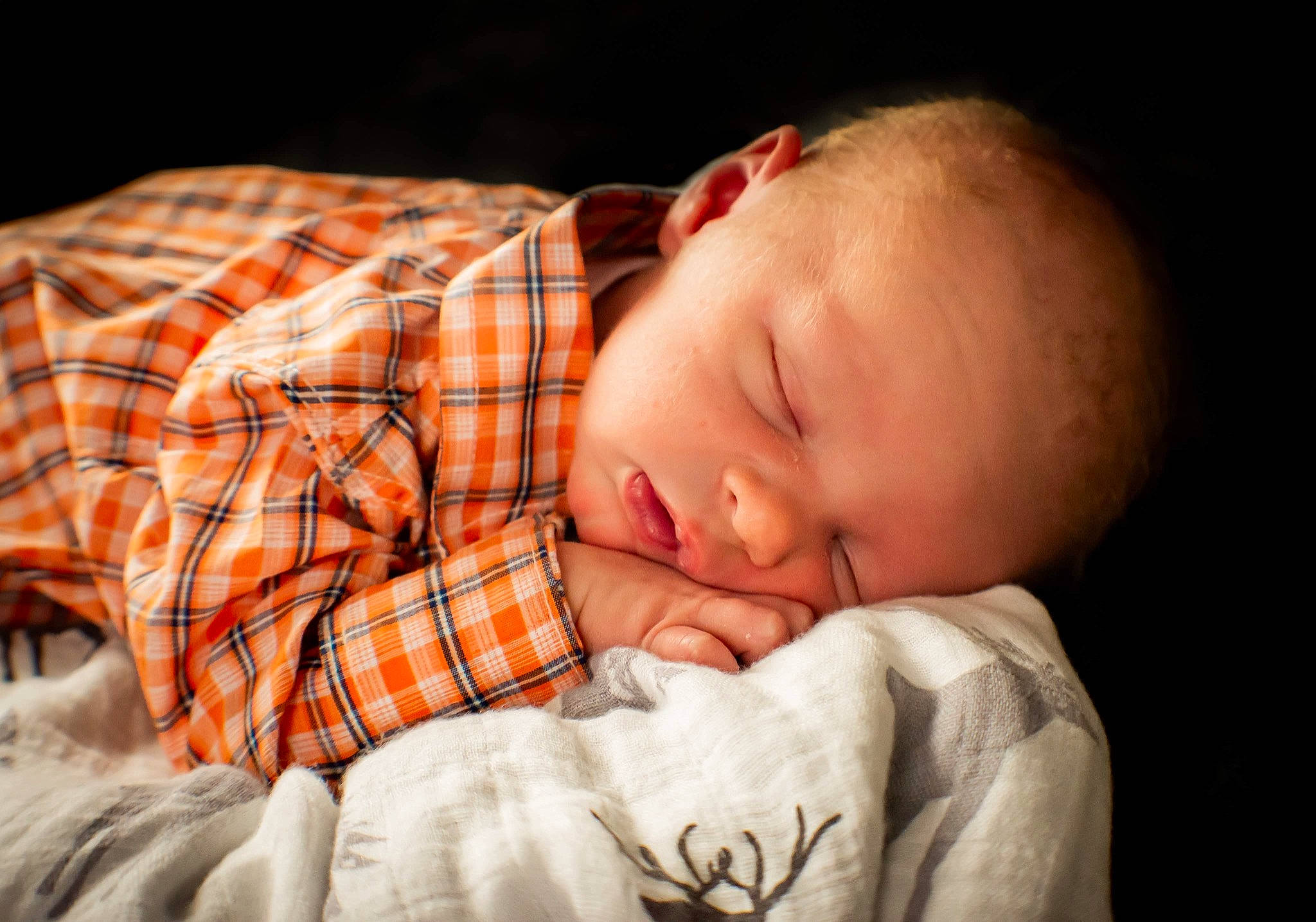 Cooper joined the competition — help win amazing prizes! baby, baby_toddler_clothing, bedtime, cheek, child, comfort, darkness, flash_photography, flesh, gesture, linens, nap, nose, pattern, person, plaid, portrait_photography, sleep, sleeve, tartan