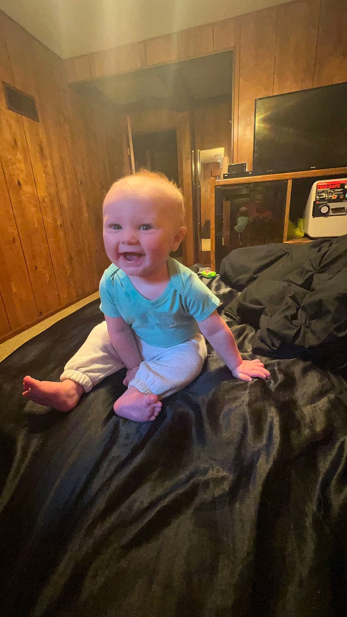 Cooper joined the competition — help win amazing prizes! baby, baby_toddler_clothing, child, comfort, floor, flooring, fun, happy, hardwood, home_appliance, joy, living_room, person, room, sitting, smile, standing, t_shirt, television, television_set