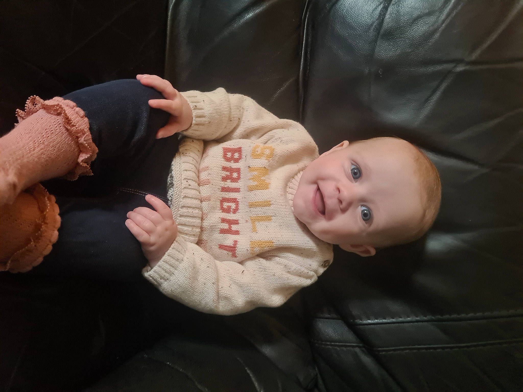 Holly joined the competition — help win amazing prizes! baby, baby_products, baby_toddler_clothing, cheek, child, comfort, face, finger, gesture, joy, nail, person, sitting, skin, sleeve, smile, thumb, toddler, wood, wrist