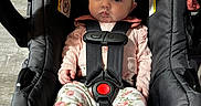 Alaina joined the competition — help win amazing prizes! baby, infant, car_seat, floral_headband, pink_clothing, patterned_pants, baby_shoes, seatbelt, child, indoor, portrait, cute, toddler, person, fashion, sitting, adorable, safety, candid, young_child