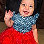 baby, child, smiling, happy, sitting, headband, bow, dress, skirt, red, blue, stars, floor, wooden_floor, indoor, cute, waving, portrait, infant, clothing